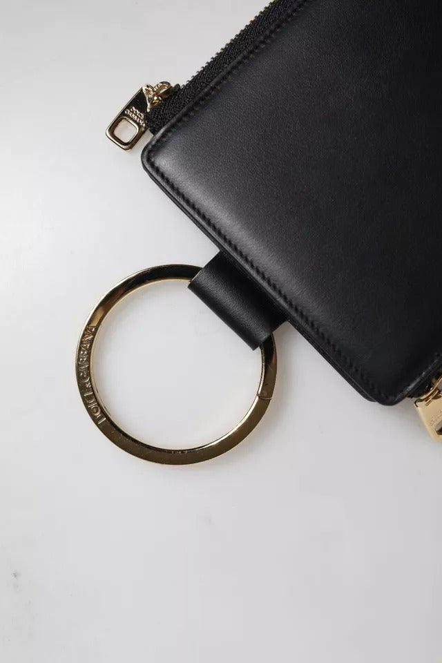 Indulge in the Dolce & Gabbana Black Leather Logo Plaque Neck Strap Card Coin Wallet, a masterpiece of Italian craftsmanship that elevates your style with timeless elegance.