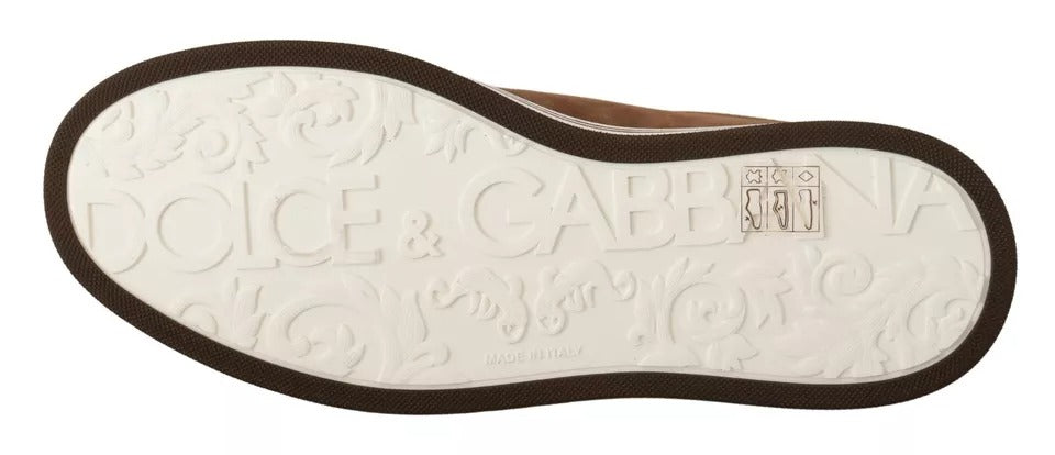 Experience the exquisite allure of Dolce & Gabbana's Brown Suede Logo Low Top Sneakers, where sumptuous craftsmanship meets timeless elegance for the discerning individual.