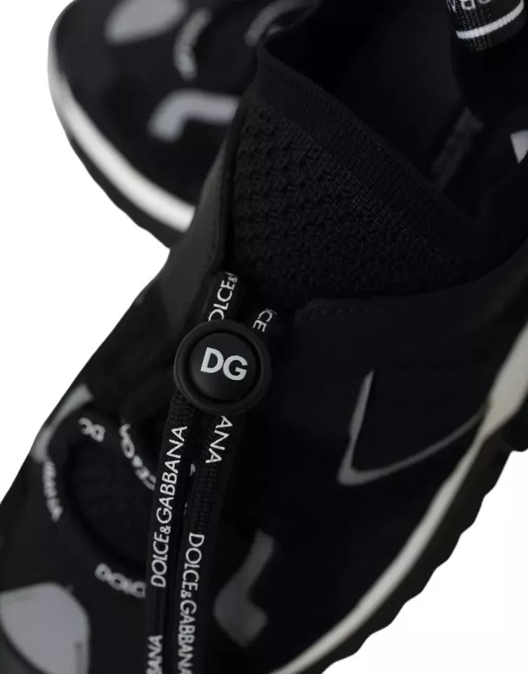 Step into the realm of opulence with Dolce & Gabbana's Black White Logo Sorrento Sneakers, crafted in Italy from luxurious materials for a sophisticated lifestyle.