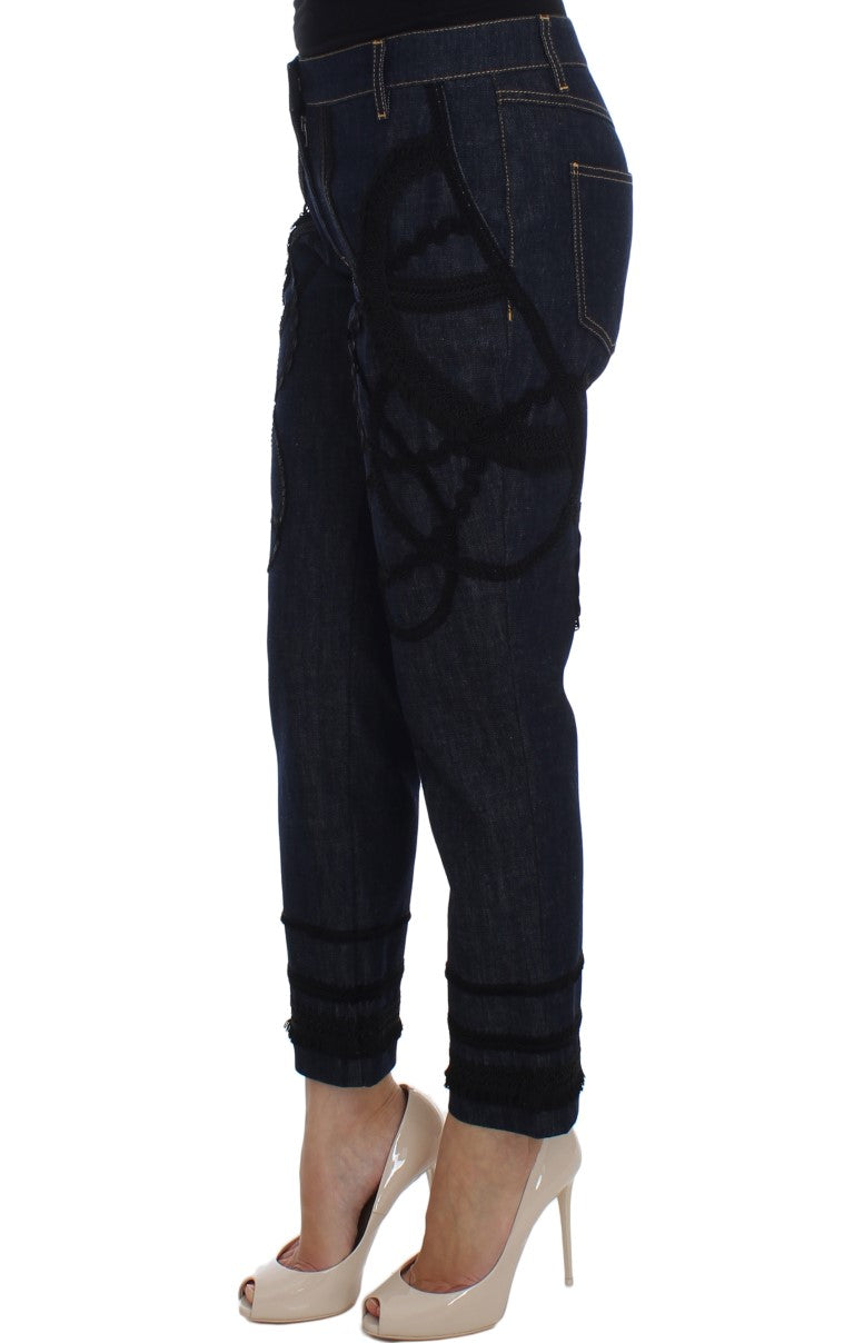 Elevate your wardrobe with Dolce & Gabbana's Blue Denim Cotton CAPRI Torero Jeans, where exquisite Italian craftsmanship meets timeless elegance, perfect for any occasion.