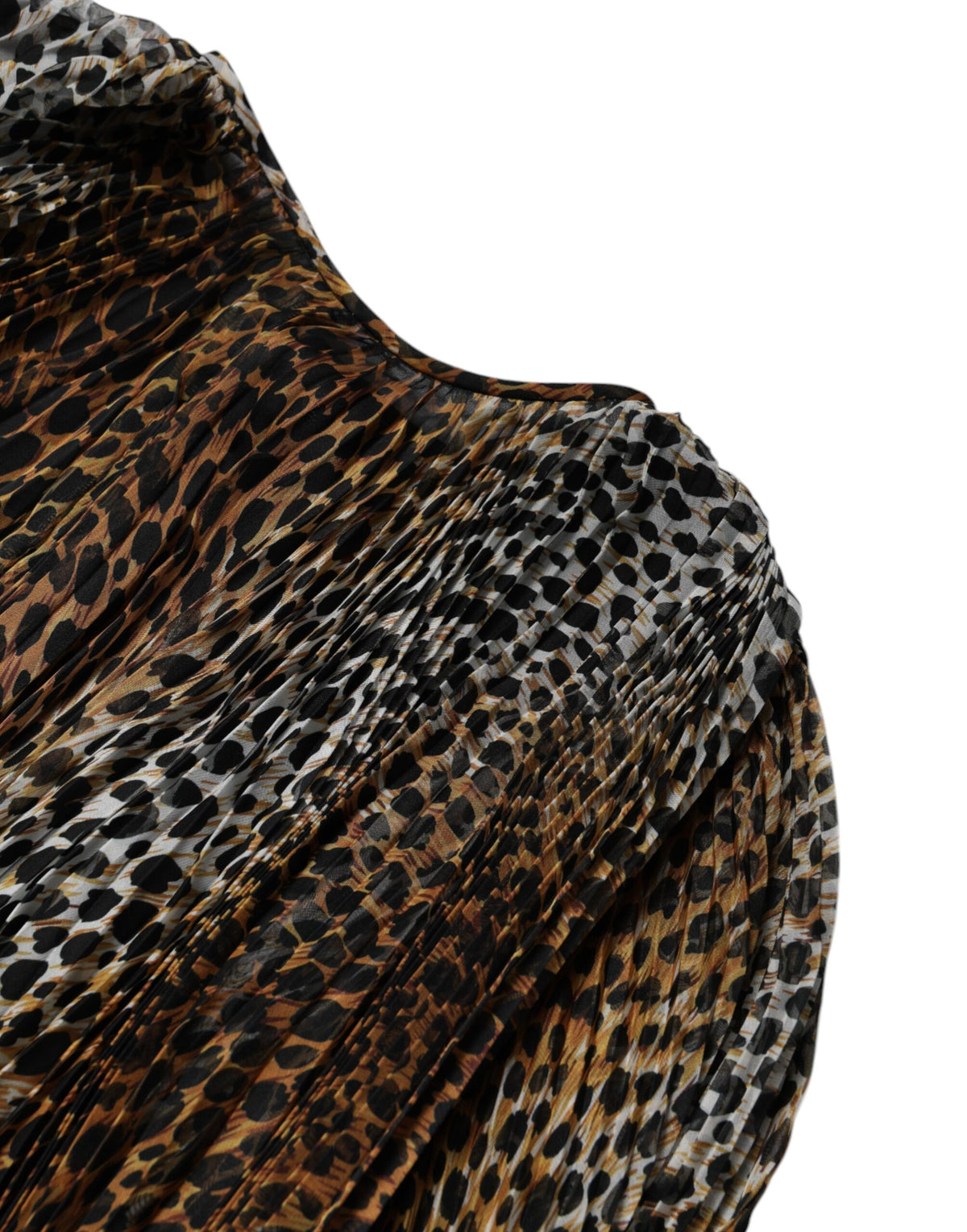 Indulge in the allure of the Dolce & Gabbana Brown Leopard Print Scarf Collared Chiffon Dress, a masterpiece of Italian craftsmanship that embodies timeless elegance and sensual sophistication.
