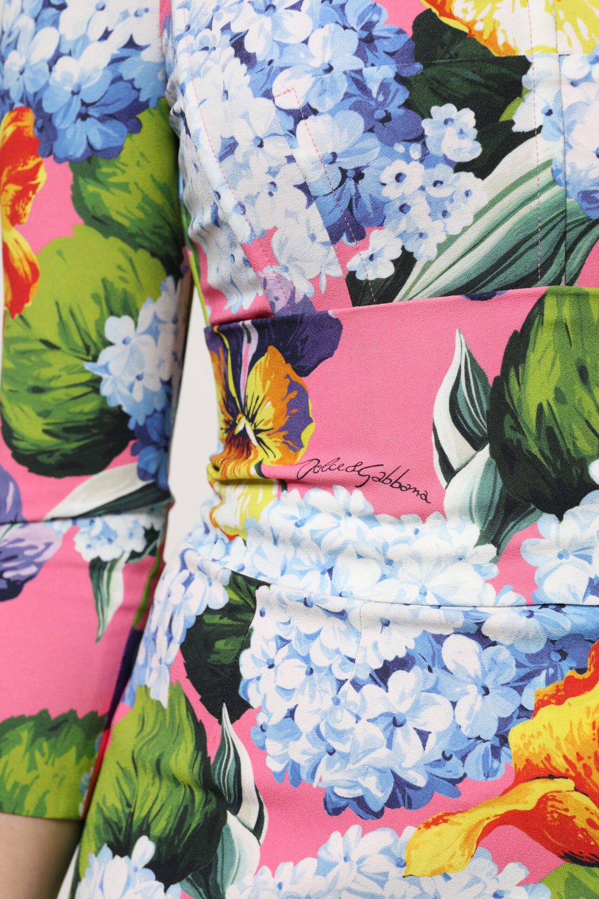 Elevate your elegance with the Dolce & Gabbana Multicolor Floral Side Slit Midi Dress, a luxurious blend of viscose and elastane, crafted for timeless sophistication.