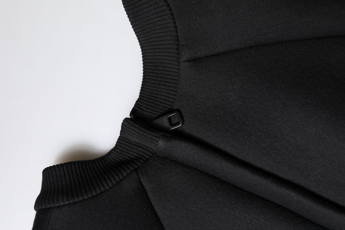Indulge in the exquisite elegance of the Dolce & Gabbana Black Cotton Long Sleeves A-line Mini Dress, a masterpiece of Italian craftsmanship that redefines luxury and sophistication.