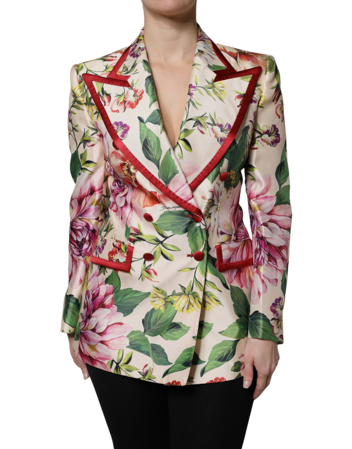 Indulge in the Dolce & Gabbana Multicolor Floral Double Breasted Jacket, a masterpiece of silk craftsmanship that embodies luxurious sophistication and timeless elegance.