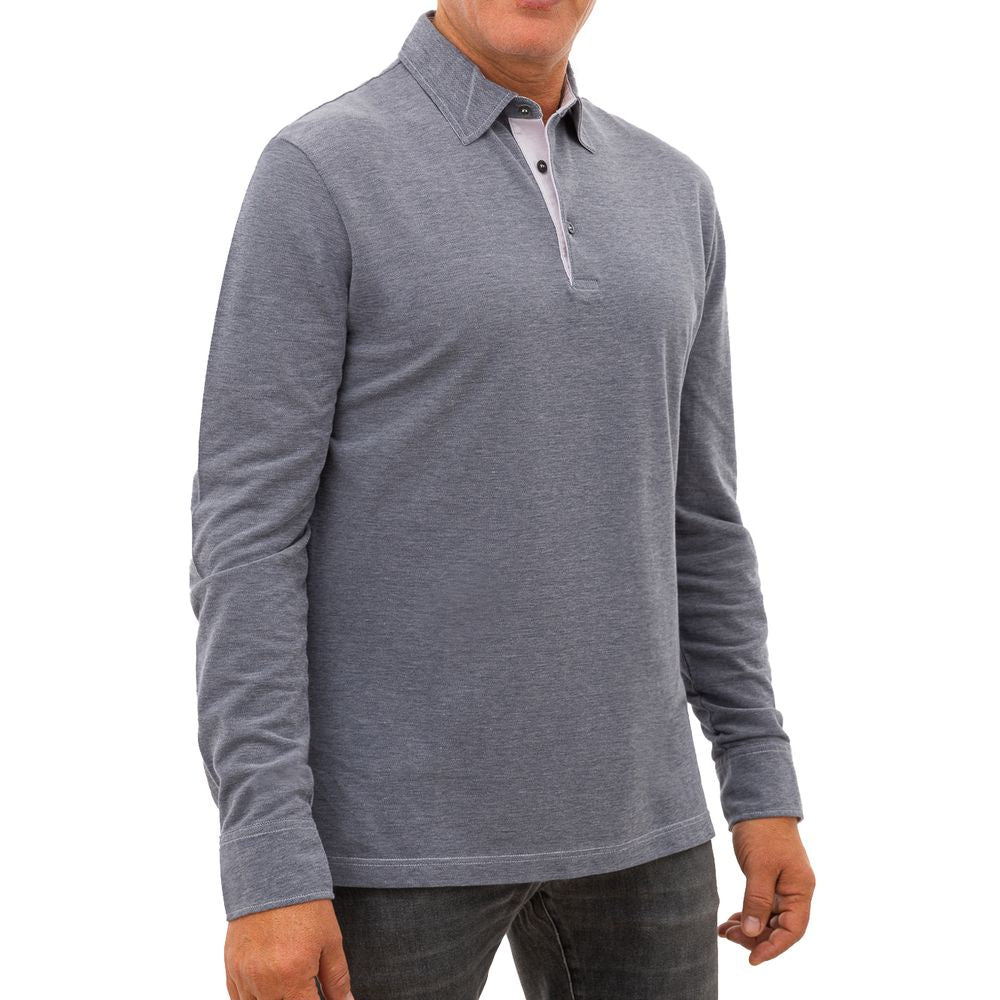Elevate your style with the Corneliani Blue Cotton Polo Shirt, a masterpiece of Italian craftsmanship, offering timeless elegance and refined sophistication for the discerning individual.