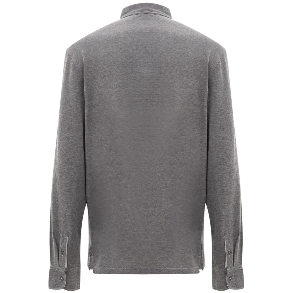 Discover the Corneliani Gray Cotton Polo Shirt, a masterpiece of Italian craftsmanship that embodies timeless elegance and sophistication for the discerning individual.