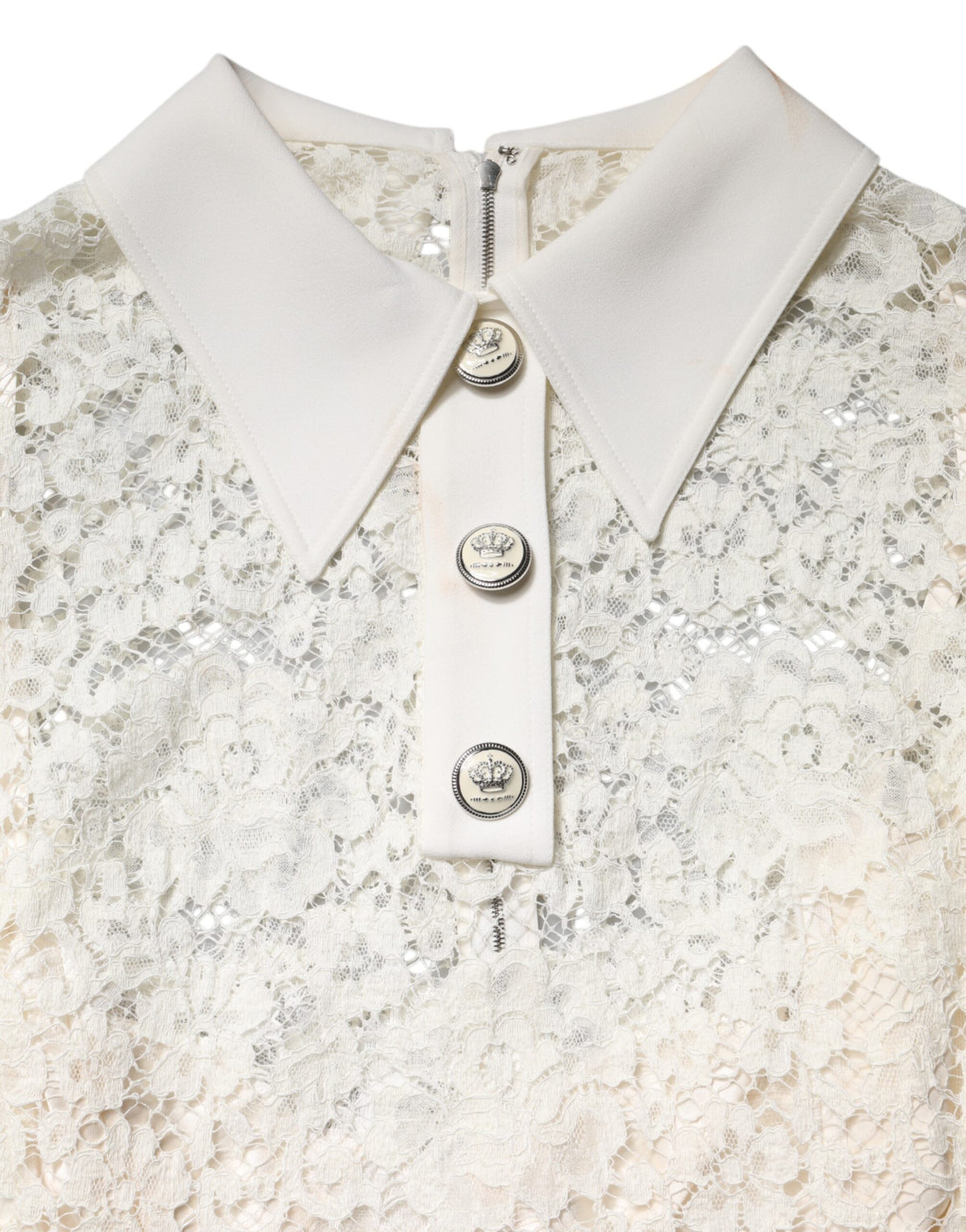 Indulge in the exquisite Dolce & Gabbana White Floral Lace Long Sleeves Shift Dress, a testament to Italian craftsmanship that elevates your elegance for any prestigious occasion.