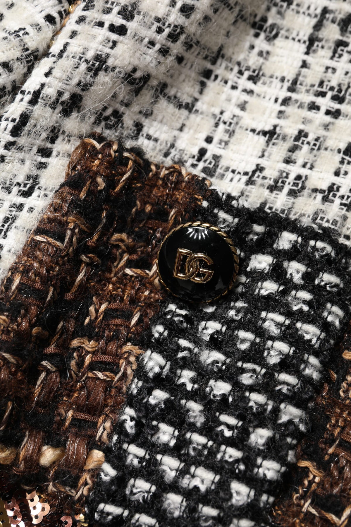 Indulge in the Dolce & Gabbana Multicolor Patchwork Button Down Jacket, a masterpiece of exquisite craftsmanship and luxurious materials, perfect for elevating your style.