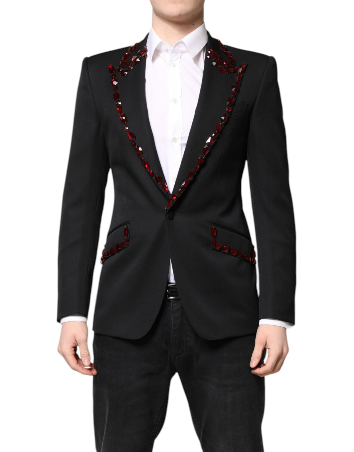 Experience the allure of Dolce & Gabbana's Black SICILIA Crystal Embellished Coat Blazer, a masterpiece of exquisite craftsmanship and luxurious materials, perfect for commanding attention.