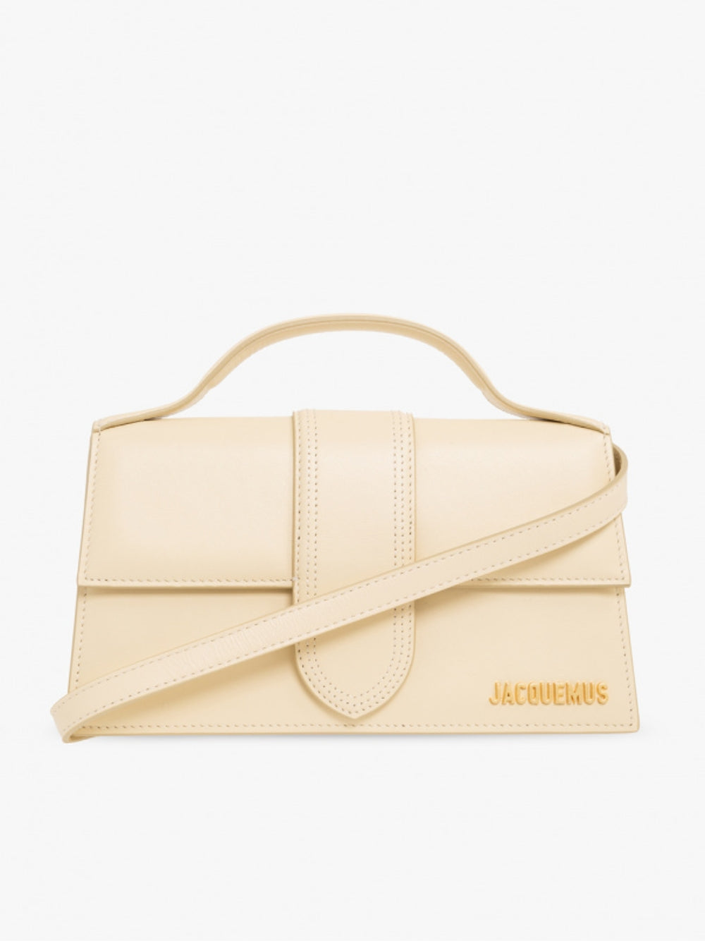 Indulge in the elegance of the Jacquemus Le Grand Bambino Beige Bag, a masterpiece of artisanal craftsmanship that elevates any ensemble with its luxurious allure.