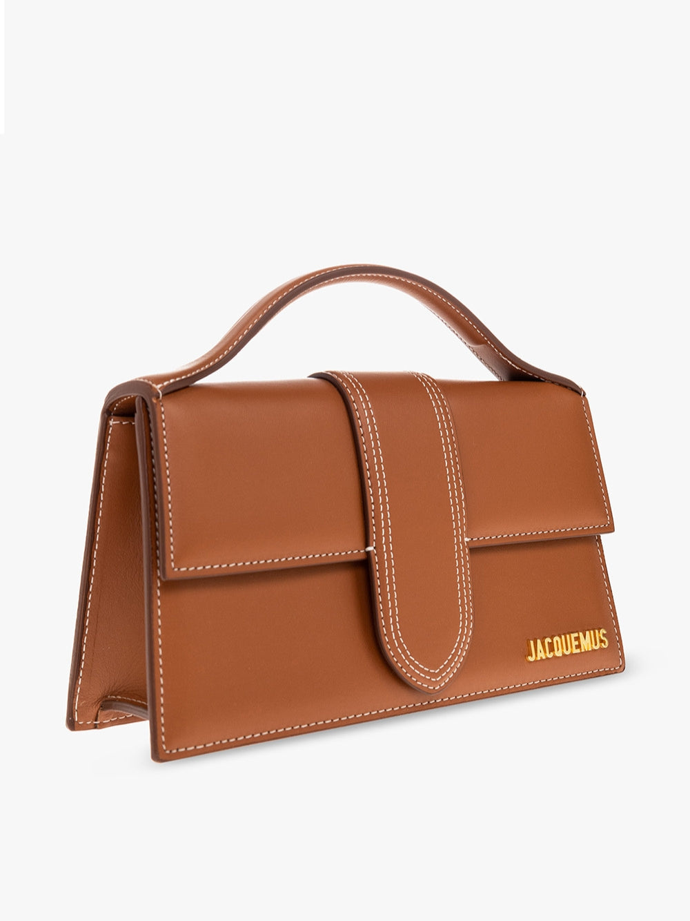 Indulge in the elegance of Jacquemus Le Grand Bambino Light Brown Bag, a masterpiece of leather craftsmanship that embodies luxury and sophistication for the discerning individual.