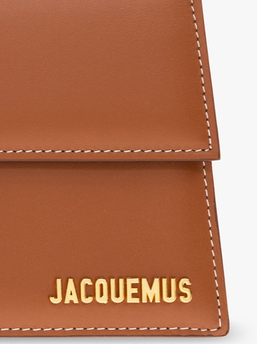 Indulge in the exquisite artistry of Jacquemus Le Grand Bambino light brown bag, a symbol of luxury and sophistication, perfect for the discerning connoisseur.