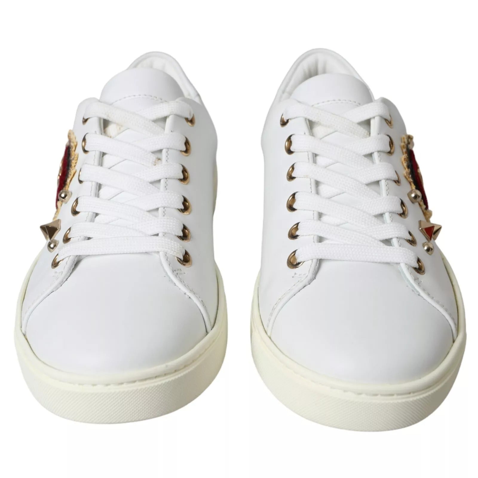 Elevate your style with Dolce & Gabbana's Portofino White Leather Sneakers, crafted from luxurious calf leather, adorned with exquisite heart detailing for the discerning individual.
