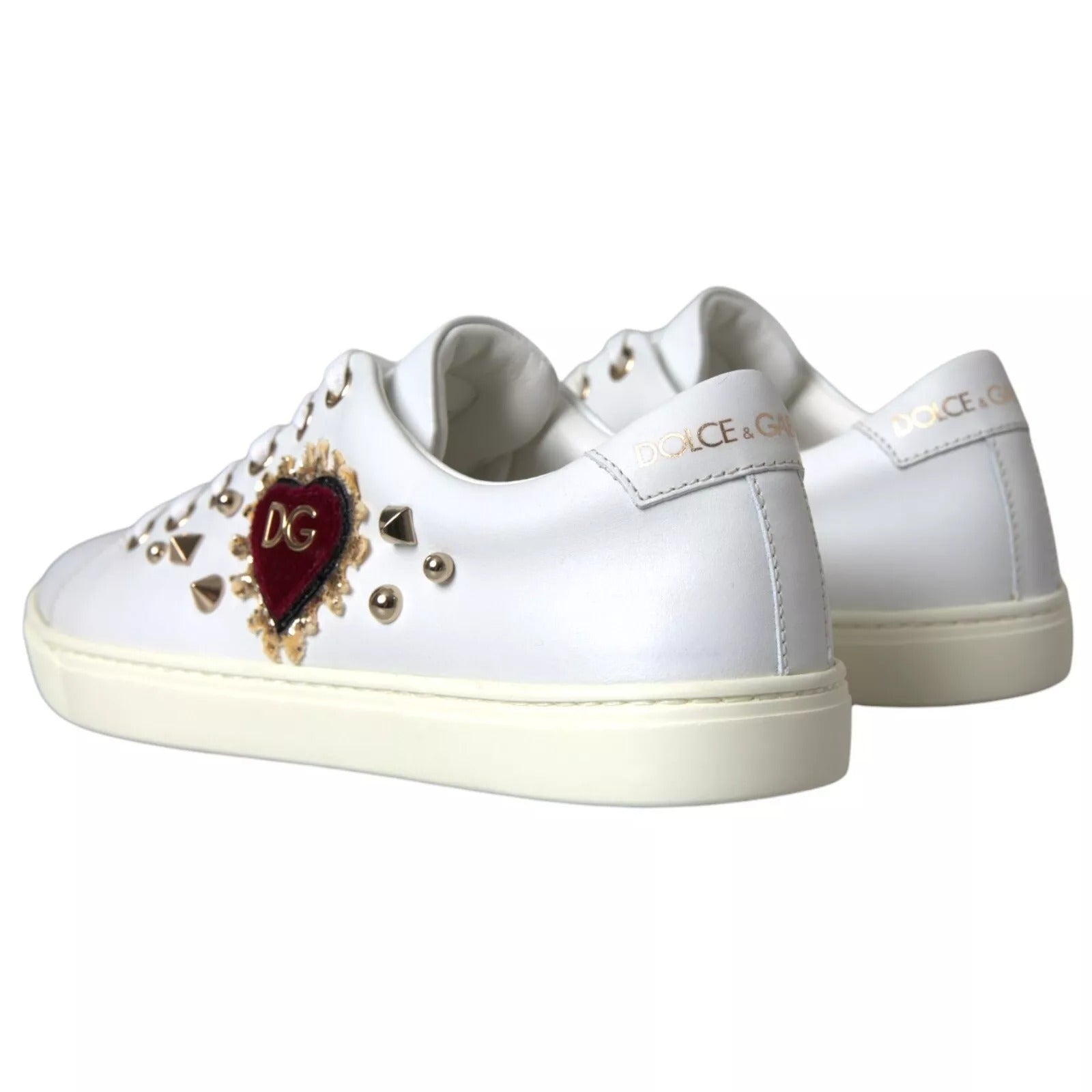 Step into luxury with Dolce & Gabbana's Portofino White Leather Sneakers, crafted from sumptuous calf leather, adorned with exquisite heart details for the modern connoisseur.