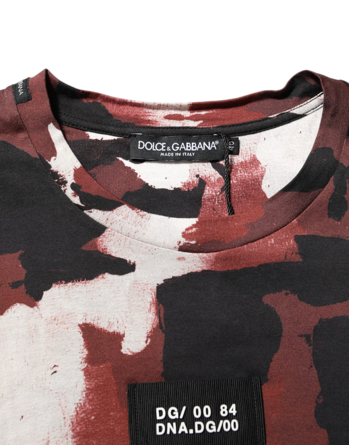 Elevate your style with the Dolce & Gabbana Multicolor Camouflage Men Crew Neck T-shirt, crafted from premium cotton in Italy, embodying luxury and effortless sophistication.