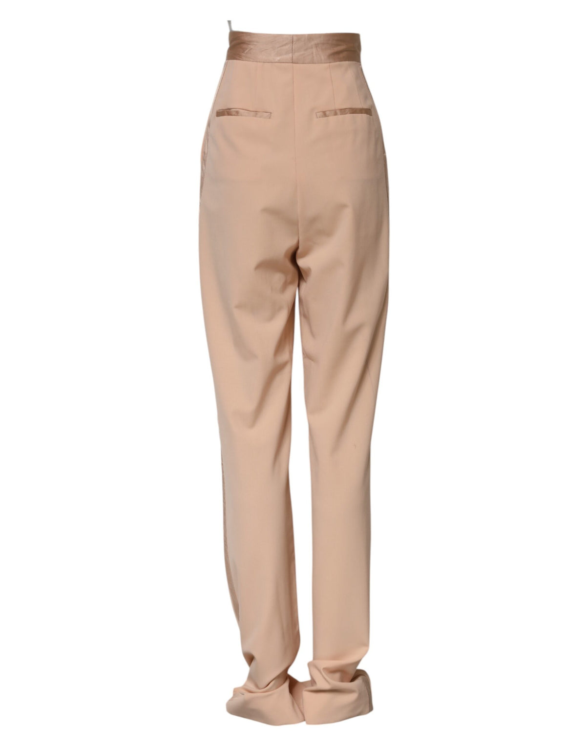 Indulge in the exquisite Dolce & Gabbana Beige Mid Waist Tapered Pants, a luxurious blend of silk and wool, embodying timeless elegance and unparalleled craftsmanship for the discerning individual.