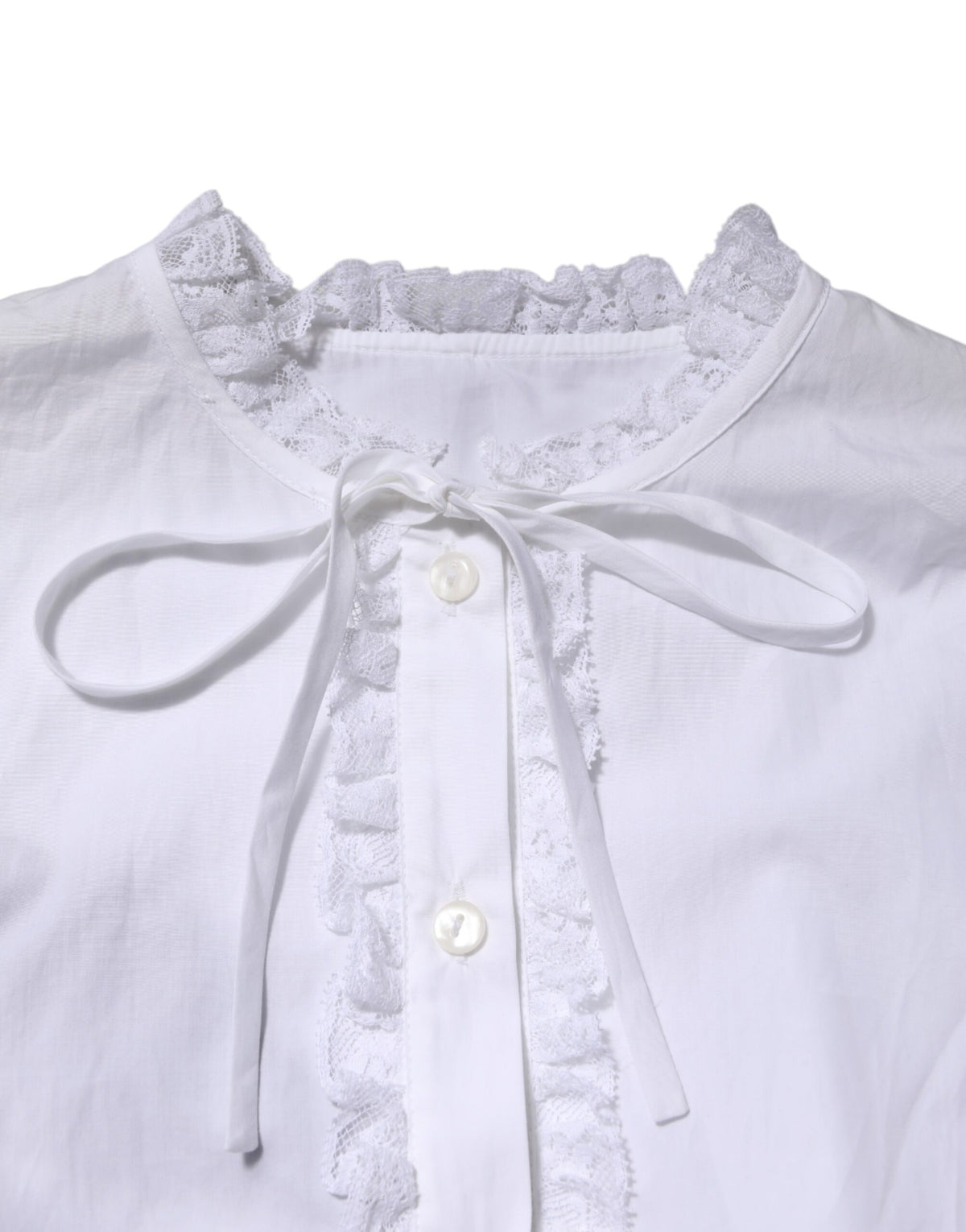 Elevate your wardrobe with the Dolce & Gabbana White Ruffled Lace Embellished Blouse Top, a masterpiece of Italian craftsmanship that embodies timeless elegance and refined femininity.