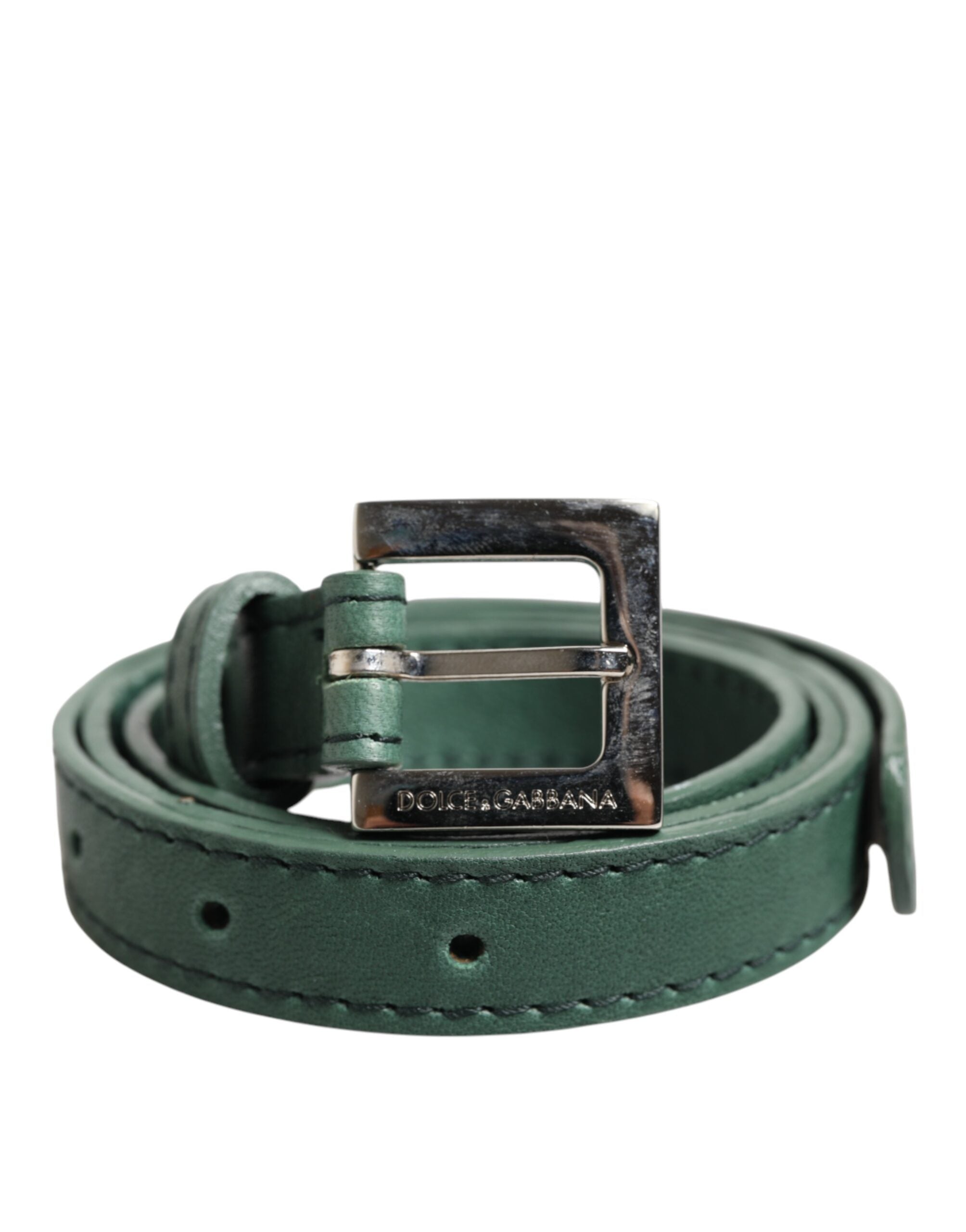 Indulge in the exquisite Dolce & Gabbana Dark Green Leather Silver Metal Buckle Belt, a masterpiece of Italian craftsmanship that elevates any ensemble with timeless elegance.