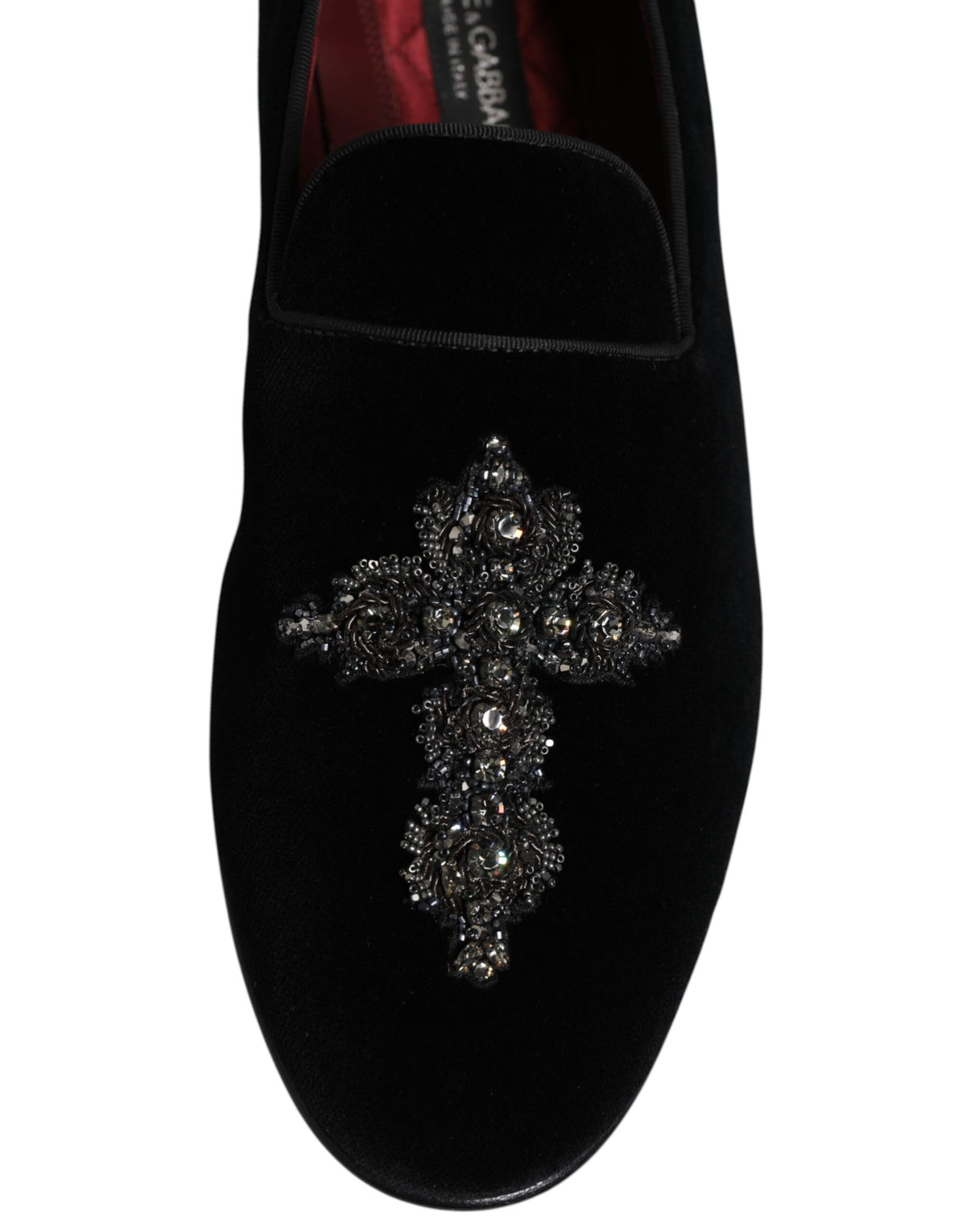 Step into the allure of Dolce & Gabbana's Black Velvet Embellished Loafer, a masterpiece of Italian craftsmanship, where luxury meets timeless elegance.