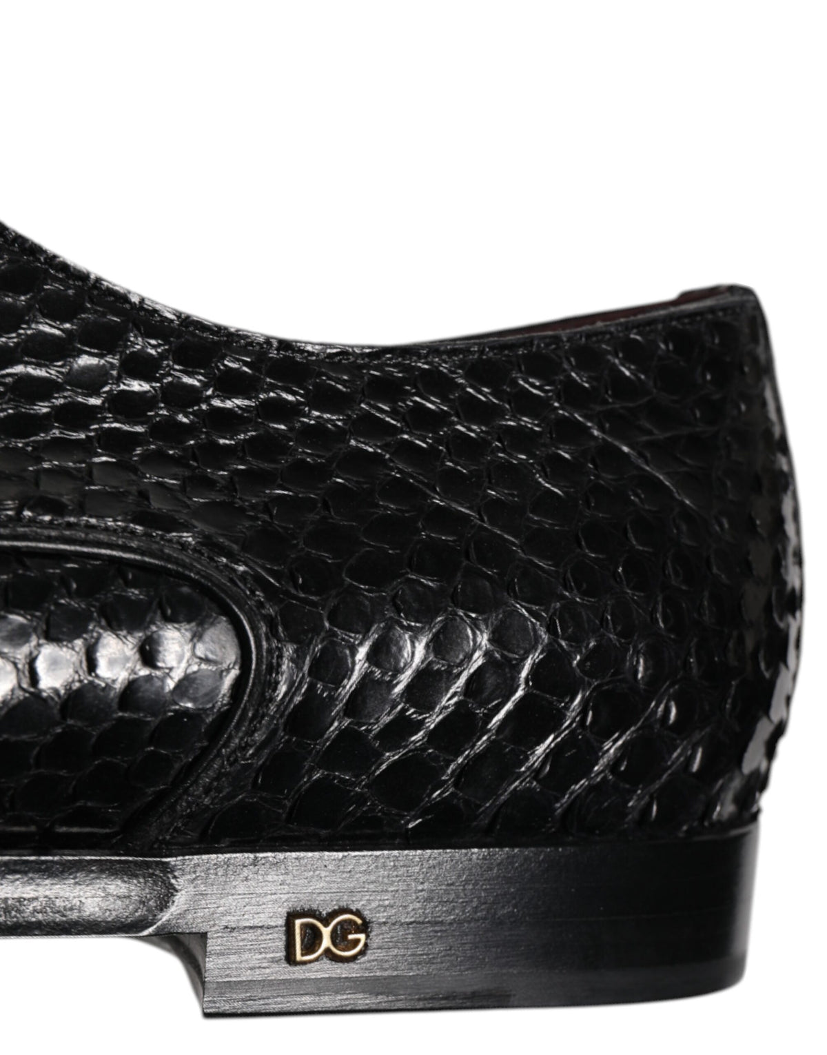 Experience the allure of Dolce & Gabbana's Black Leather Lace Up Derby Shoes, crafted from luxurious python leather, embodying timeless elegance and Italian craftsmanship.