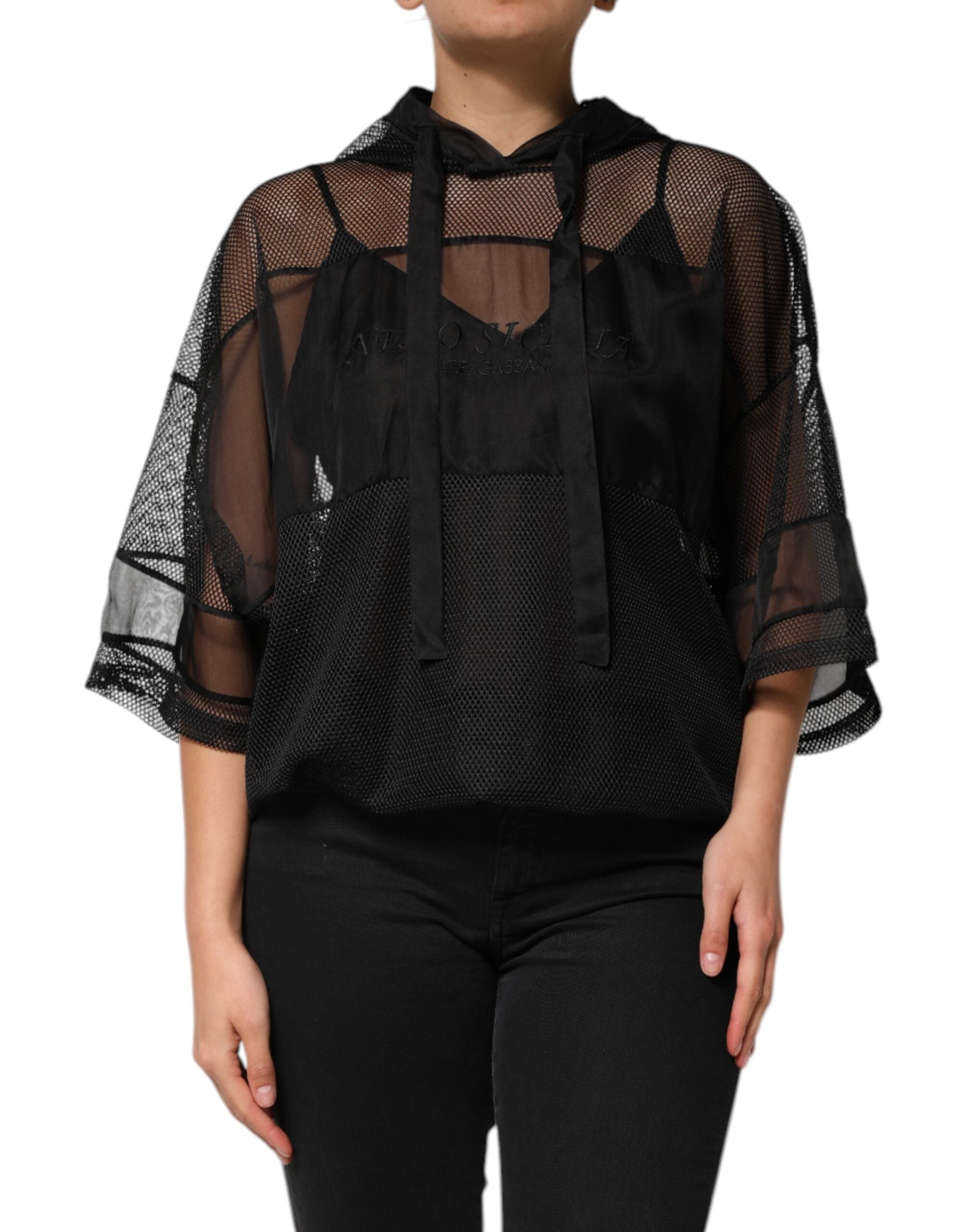 Discover the Dolce & Gabbana Black See Through Hooded Pullover Sweater, an exquisite blend of silk and polyester, embodying luxury and elegance for the discerning individual.
