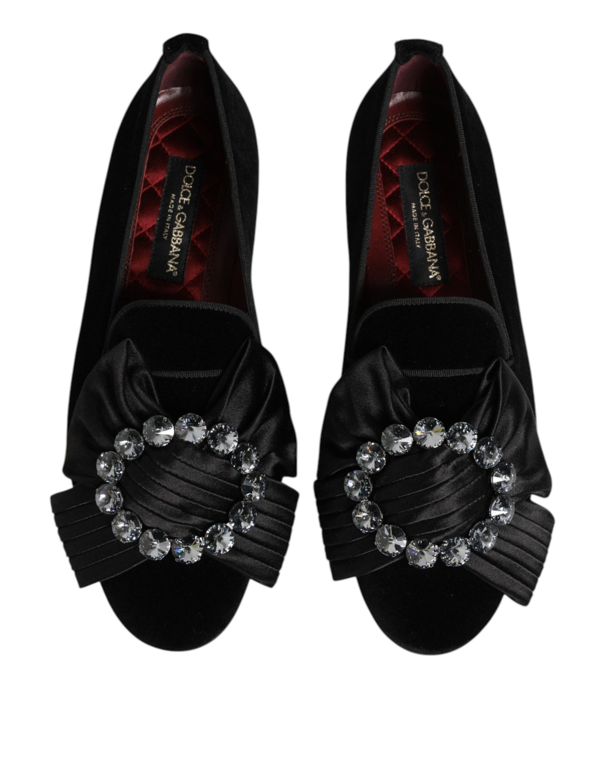 Discover the exquisite Dolce & Gabbana Black VATICANO Crystal Ribbon Slip On Shoes, crafted from premium materials, embodying timeless elegance and artisanal mastery for the discerning individual.