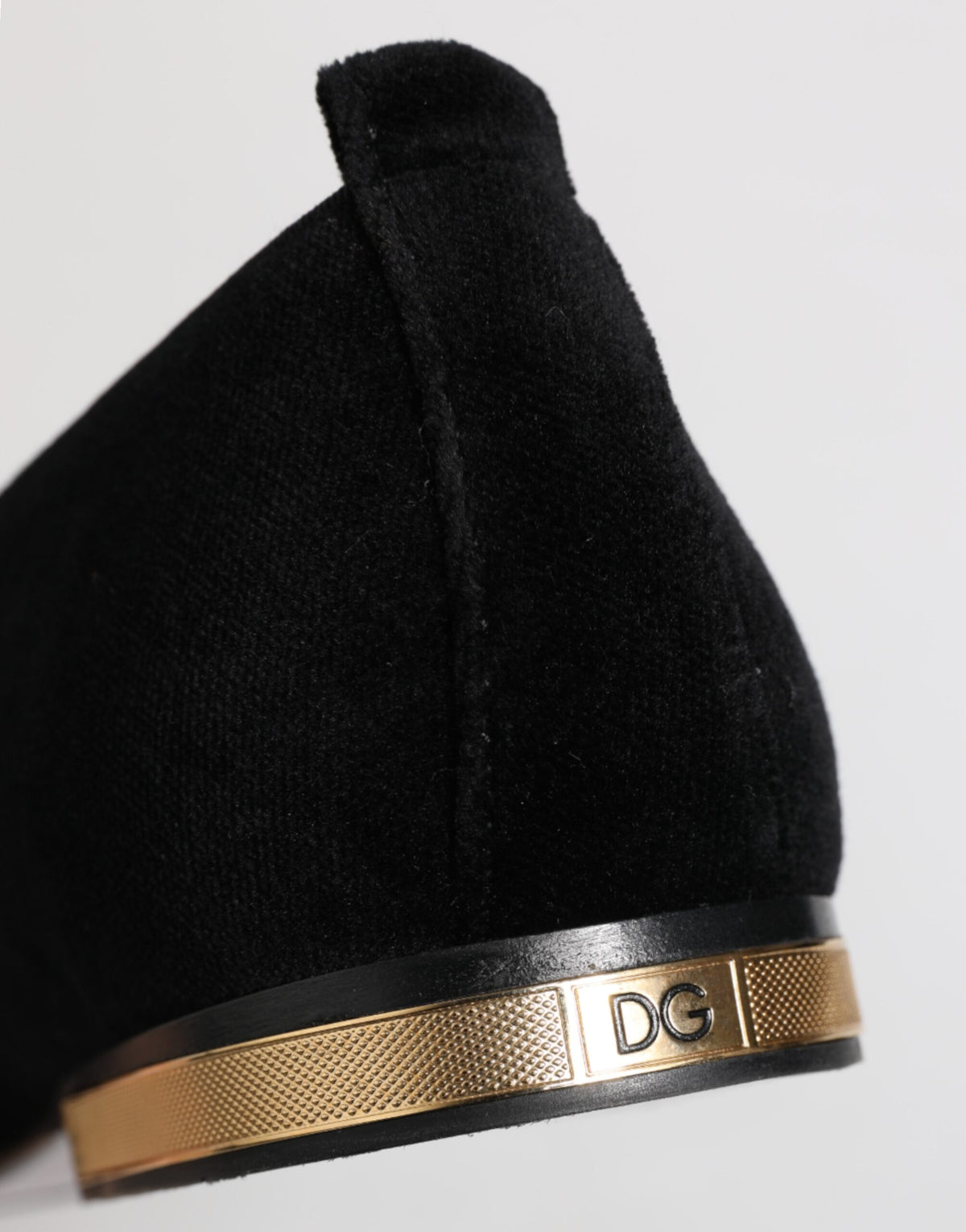Indulge in the exquisite Dolce & Gabbana Black VATICANO Crystal Ribbon Slip On Shoes, where luxurious velvet meets artisanal craftsmanship for a statement of elegance.