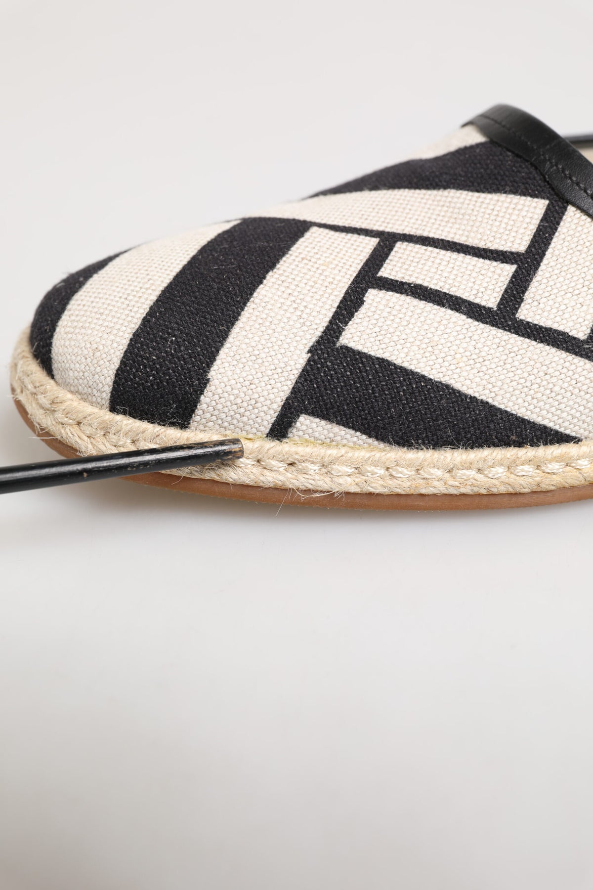 Indulge in the exquisite Dolce & Gabbana Black White Stripes Flat Espadrille Shoes, where artisanal craftsmanship meets timeless elegance for the discerning individual.