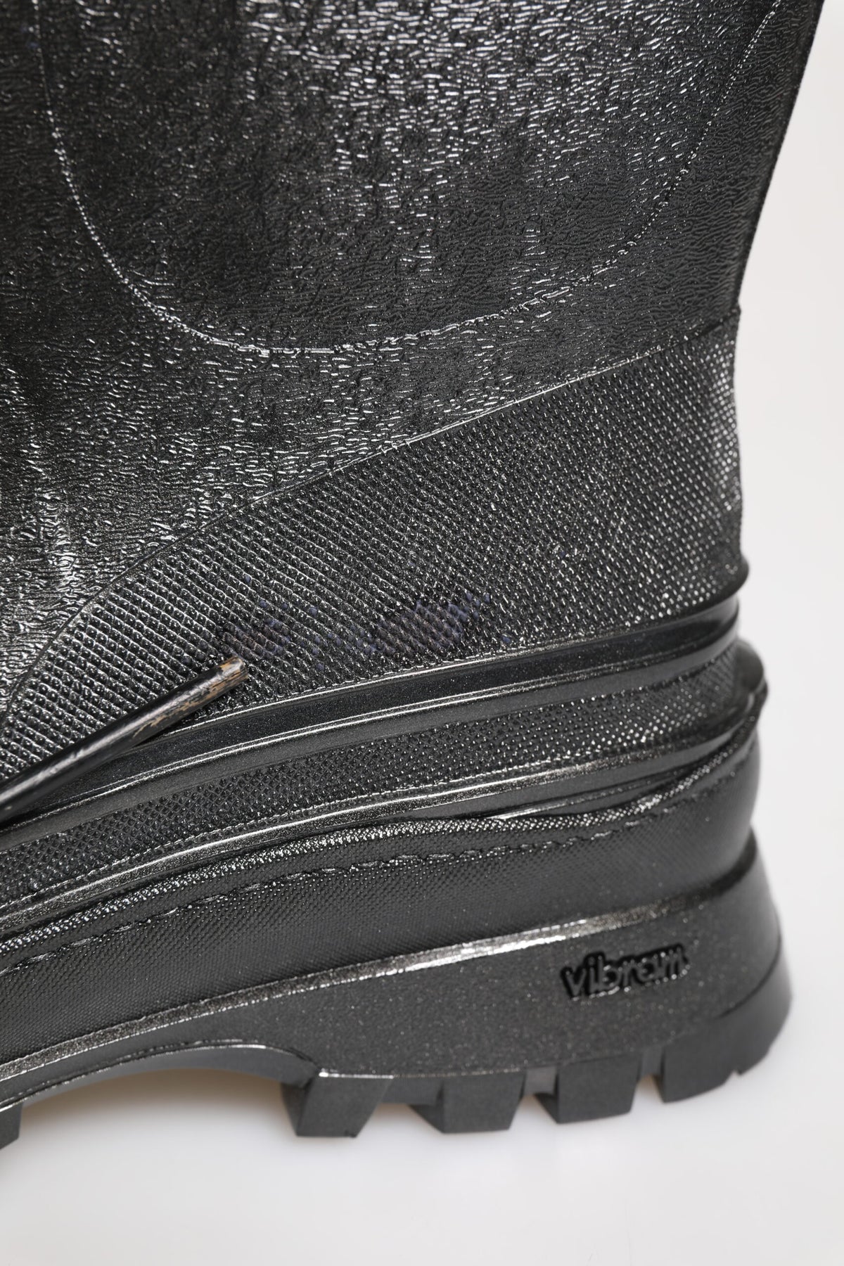 Elevate your style with Dolce & Gabbana's Metallic Gray Pull On Rain Boots, crafted from luxurious rubber for unparalleled elegance and all-day comfort.