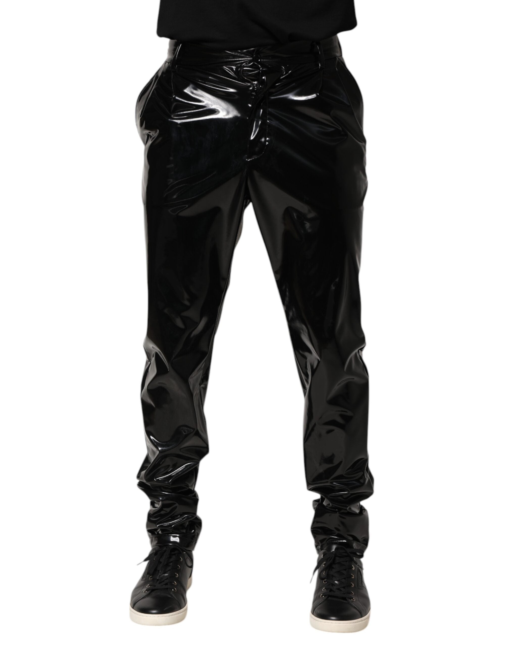 Discover the exquisite Dolce & Gabbana Black Polyester Mid Waist Men Trouser Pants, a masterpiece of Italian craftsmanship that embodies luxury and sophistication for the discerning individual.