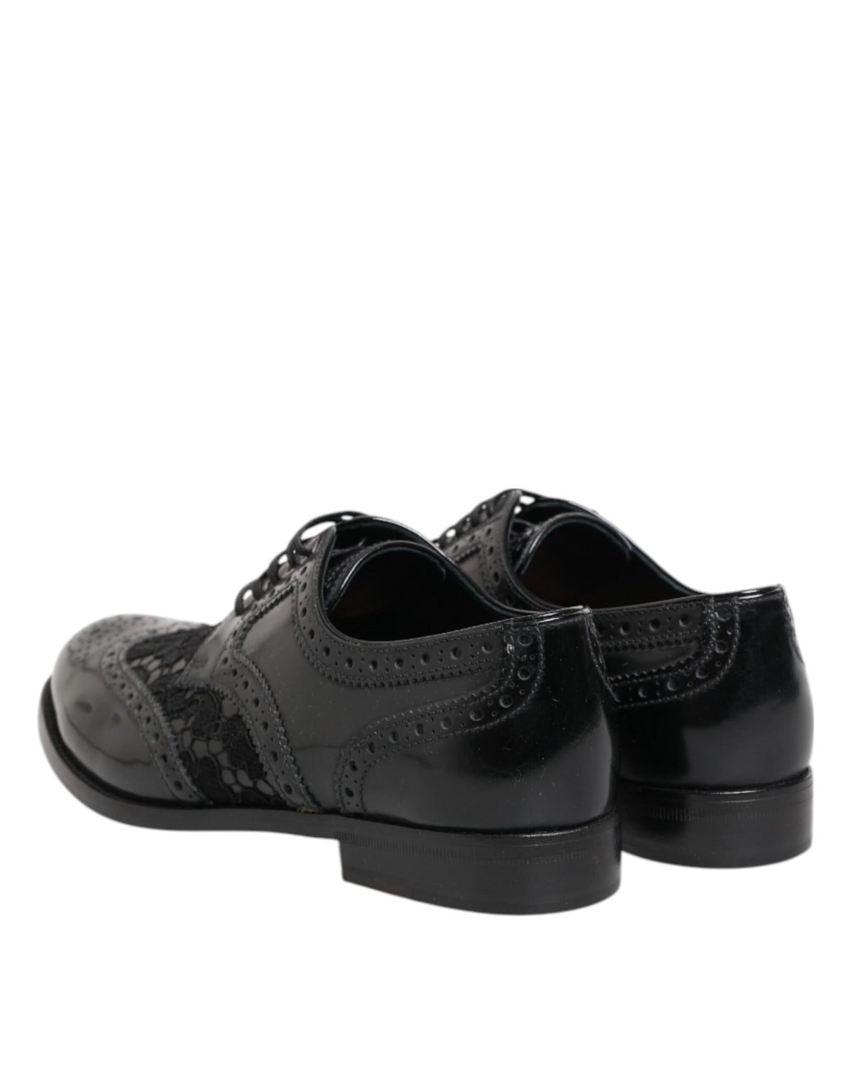 Elevate your elegance with Dolce & Gabbana's Black Leather Floral Lace Dress Formal Shoes, where exquisite craftsmanship meets timeless allure, perfect for the discerning individual.