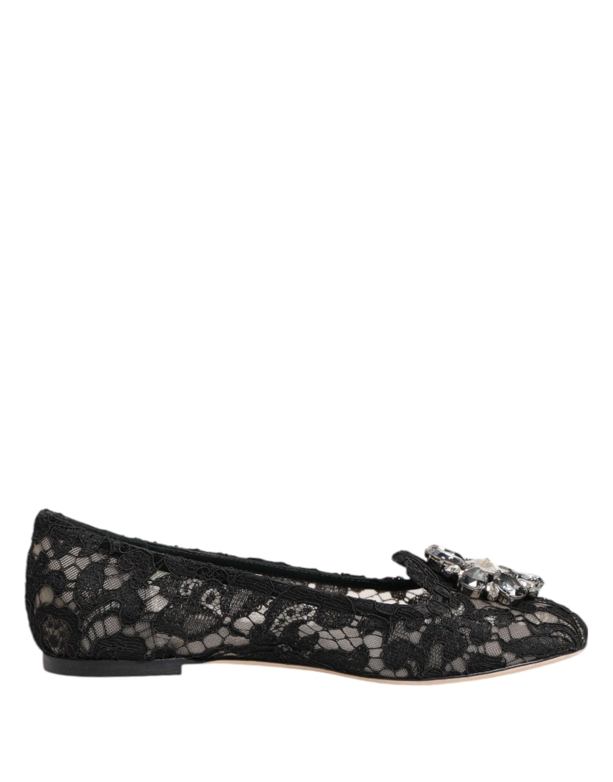 Elevate your elegance with Dolce & Gabbana's Black Taormina Lace Crystals Flats, where exquisite Italian craftsmanship meets timeless sophistication for the discerning individual.