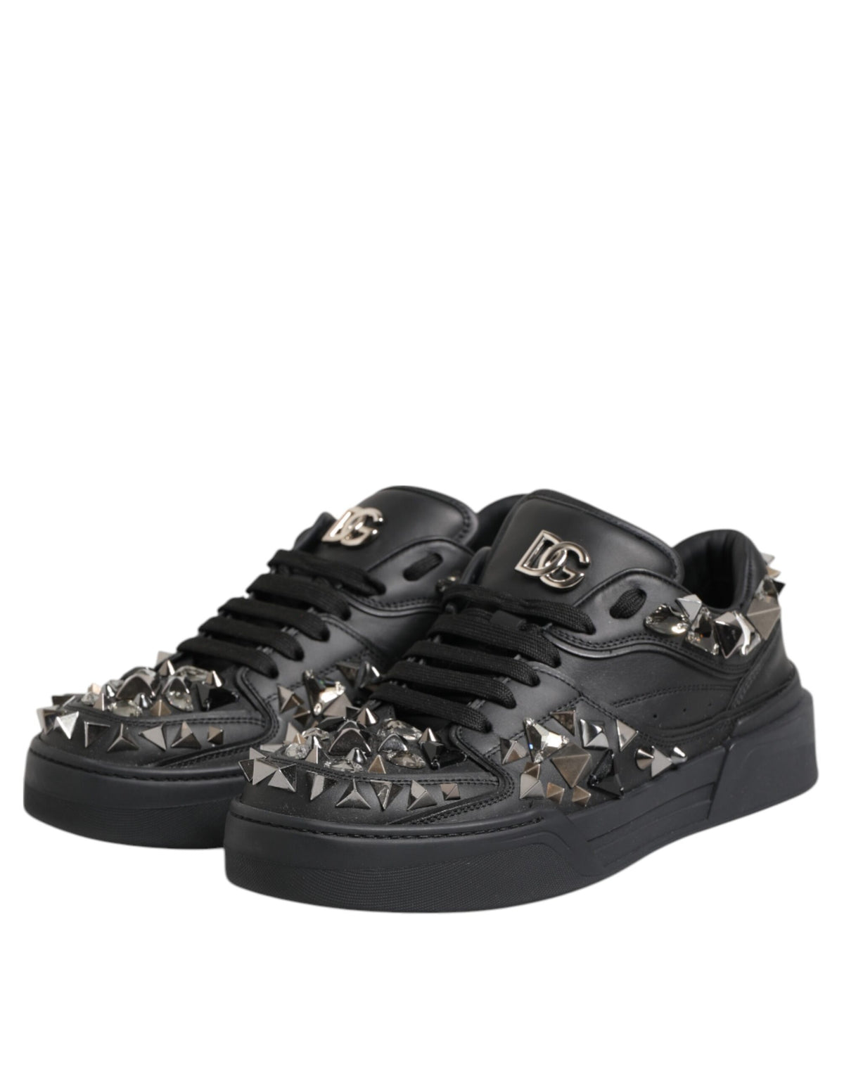 Indulge in the exquisite Dolce & Gabbana Black Leather Studded Low Top Sneakers, where unparalleled craftsmanship and luxurious design elevate your style to new heights.