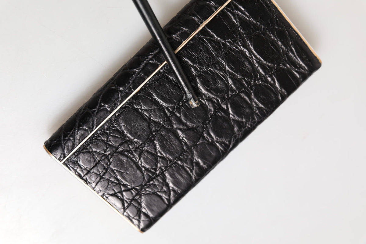 Experience the exquisite Dolce & Gabbana Black Leather Exotic Power Bank, a blend of luxury and utility, crafted from 100% exotic leather for the discerning individual.