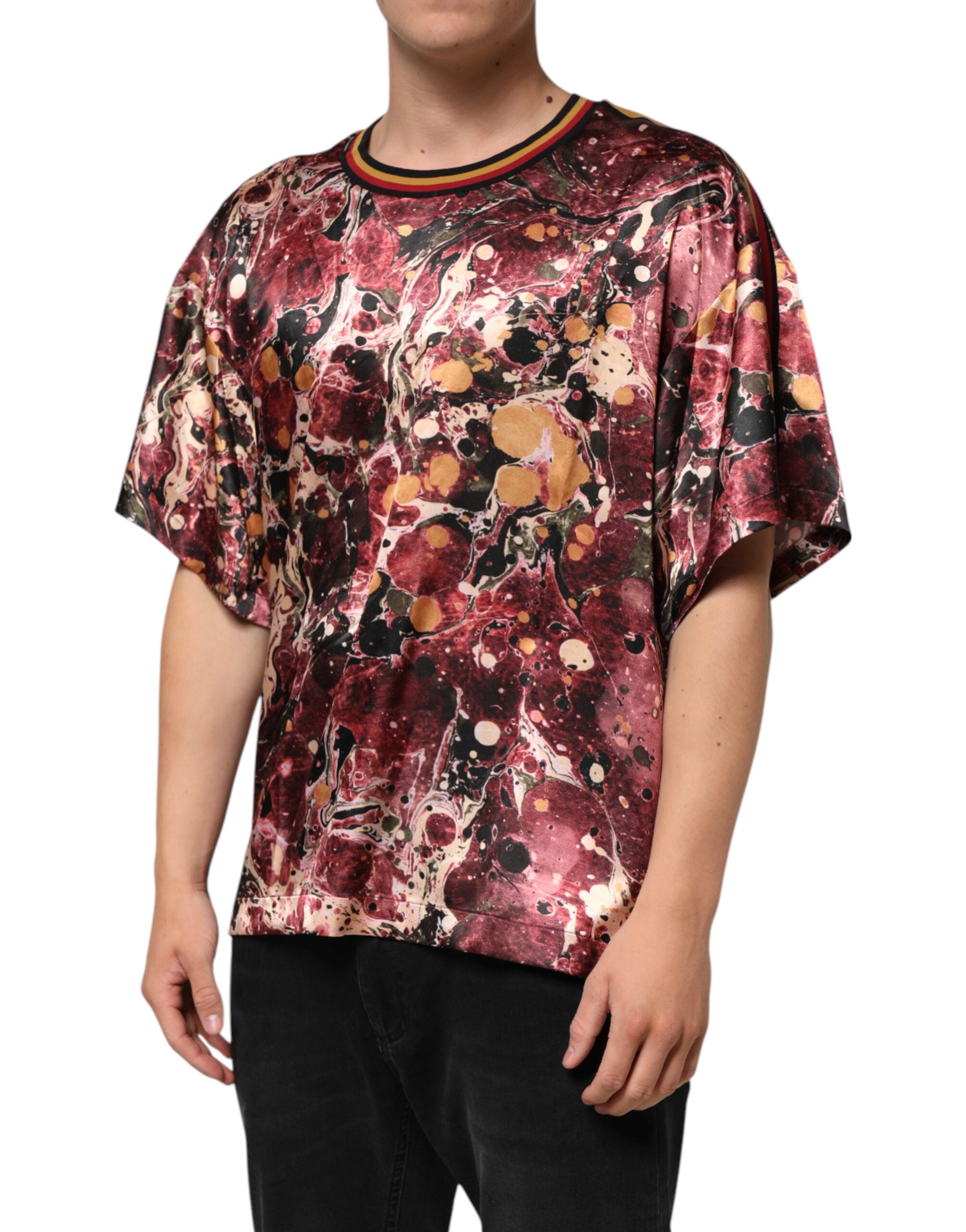 Elevate your wardrobe with the Dolce & Gabbana Multicolor Marble Print Oversize T-shirt, where exquisite craftsmanship meets bold artistry, perfect for the discerning individual.