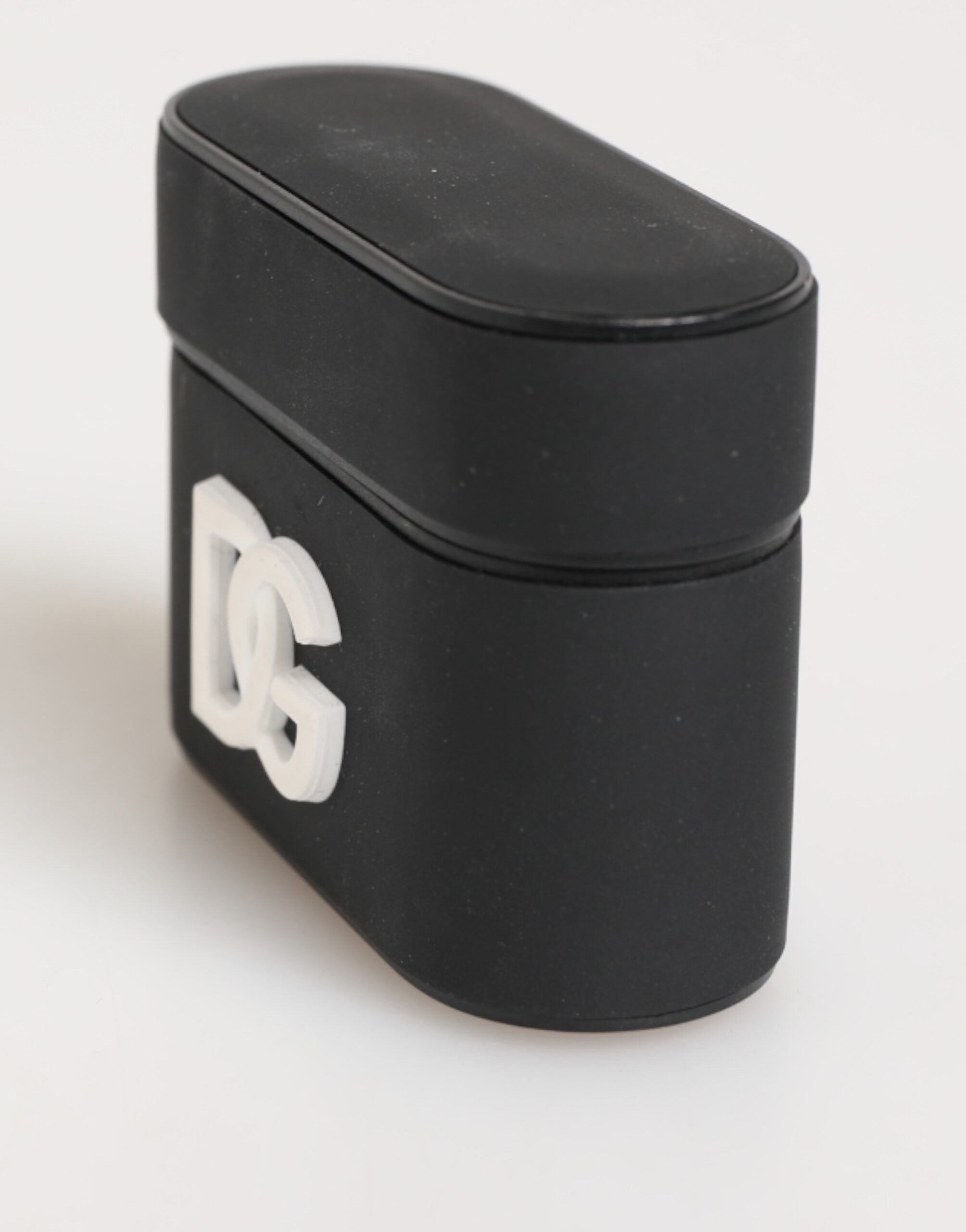 Custodia Airpods in gomma nera e bianca con logo in rilievo di Dolce &amp; Gabbana