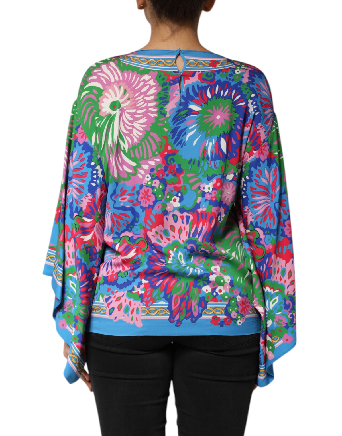 Elevate your wardrobe with the Dolce & Gabbana Multicolor Floral Print Silk Blouse, a luxurious piece that embodies Italian elegance and exquisite craftsmanship.