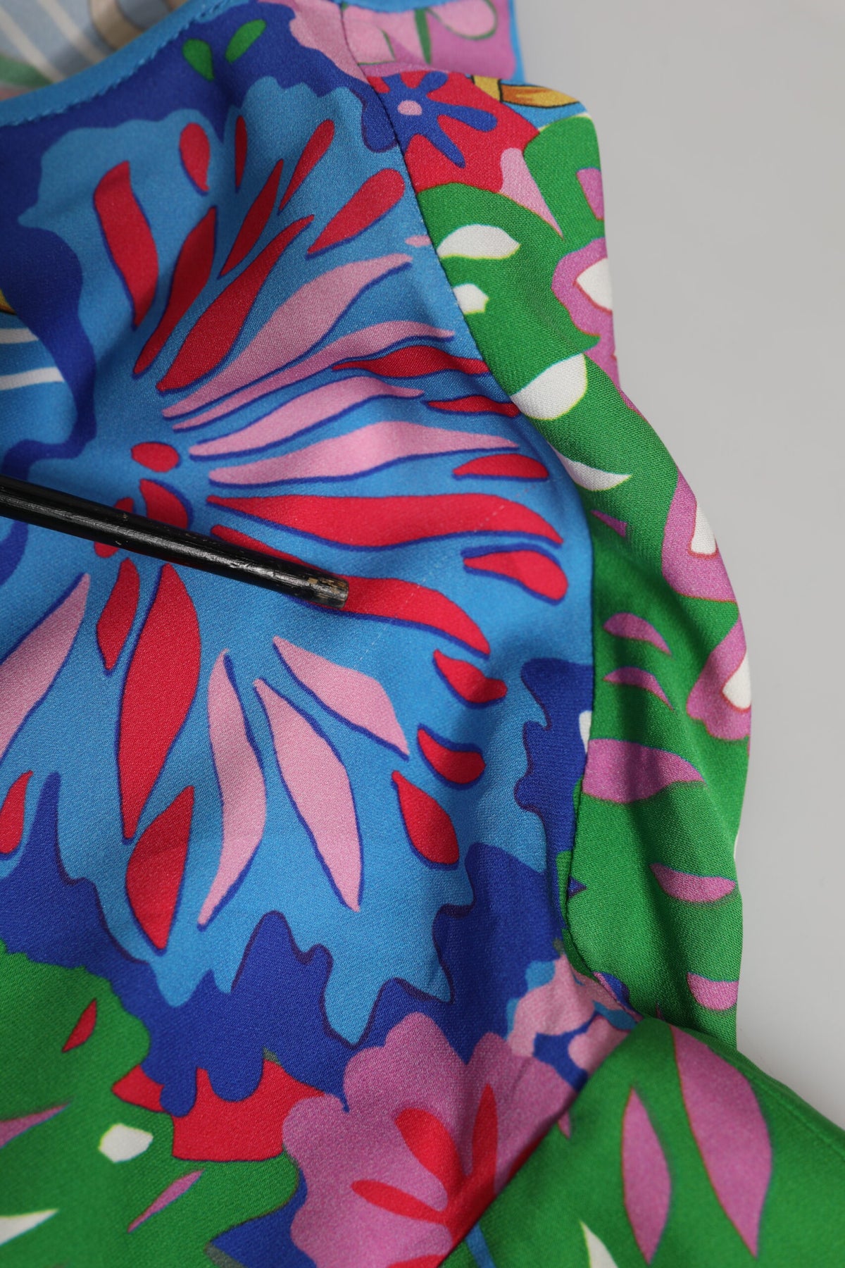 Indulge in the exquisite Dolce & Gabbana Multicolor Floral Printed Tunic Blouse, crafted from luxurious silk, embodying Italian elegance and timeless sophistication for any occasion.