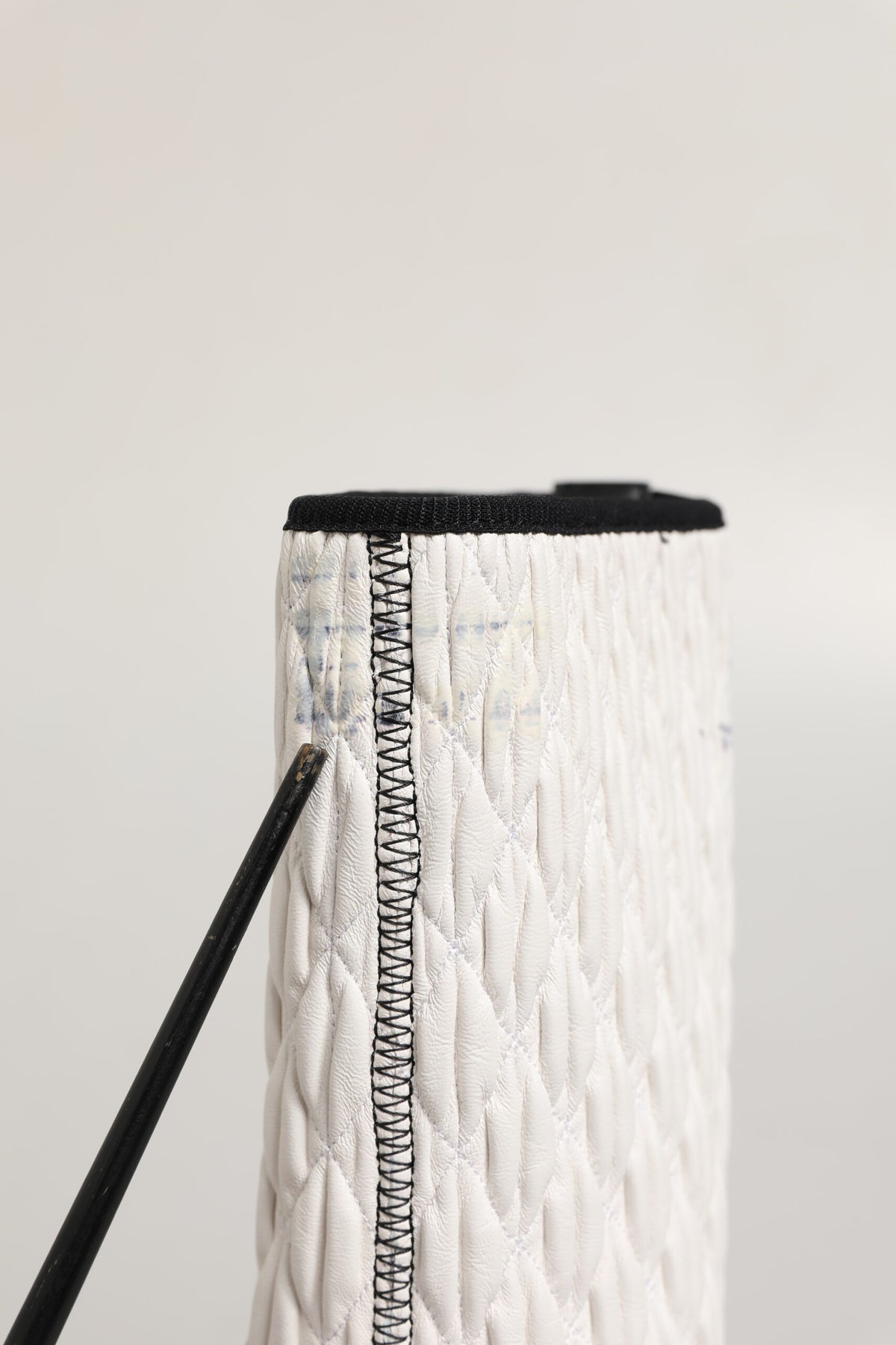 Elevate your style with Dolce & Gabbana's White Lambskin Leather Mid Calf Boots, where exquisite craftsmanship meets modern elegance for the discerning individual.