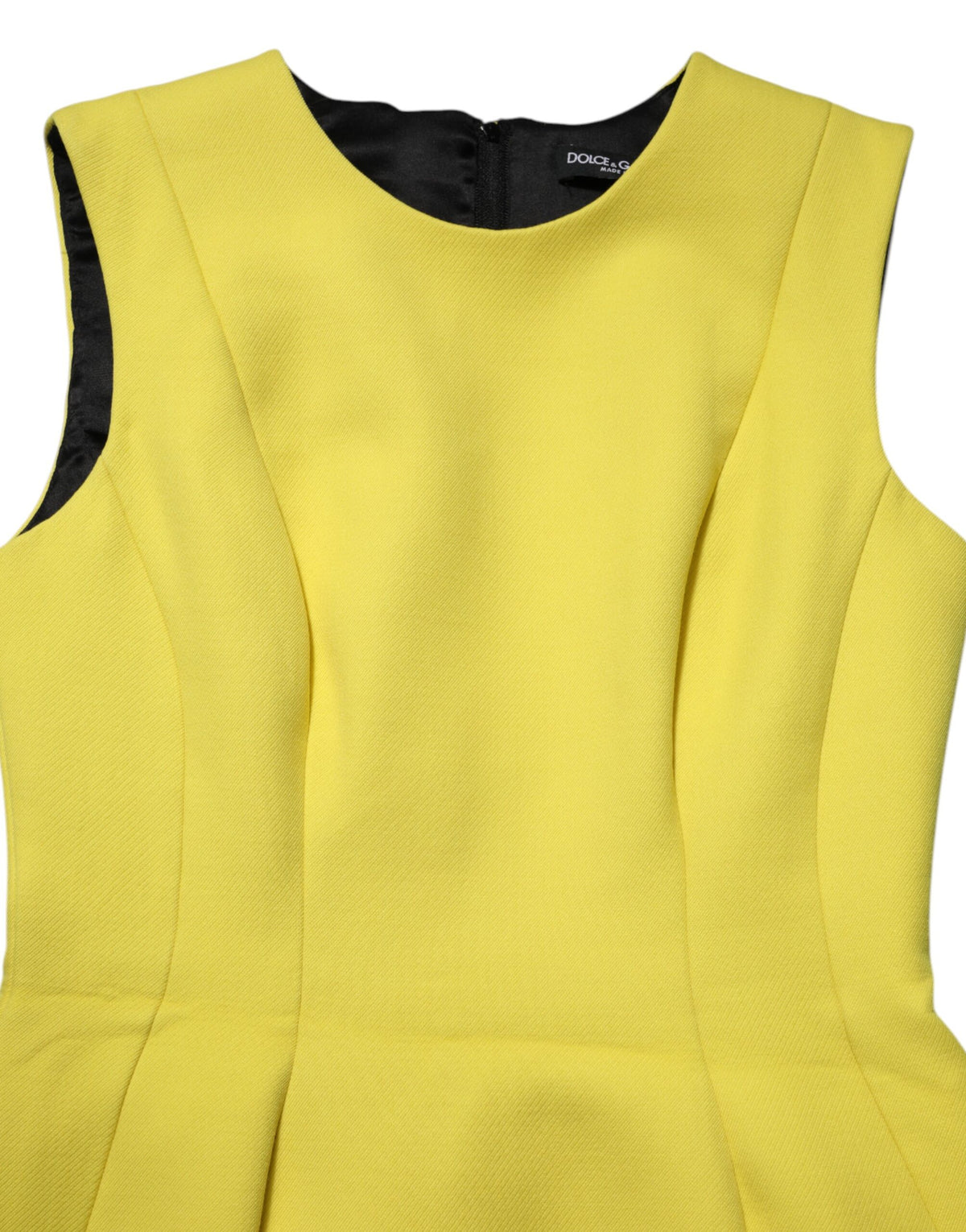Indulge in the exquisite Dolce & Gabbana Yellow A-line Sheath Mini Dress, a luxurious blend of wool and silk, expertly crafted in Italy for the discerning fashion connoisseur.