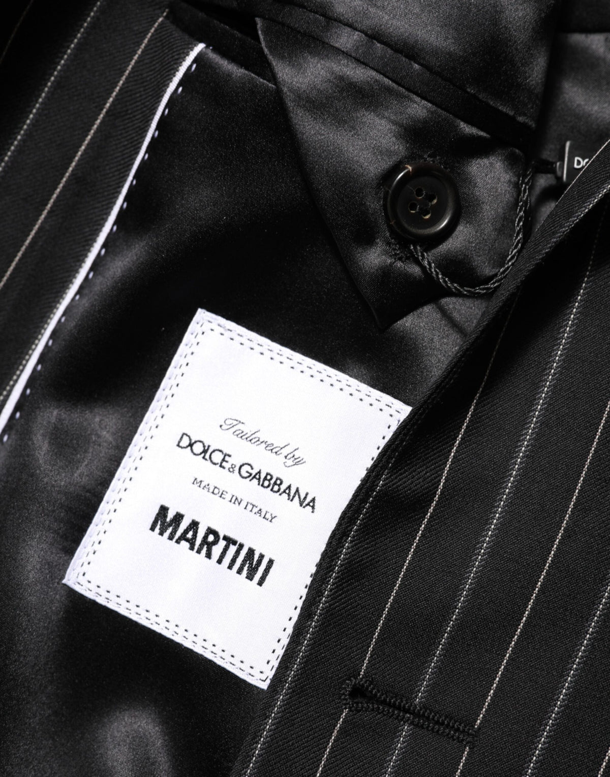 Elevate your wardrobe with the Dolce & Gabbana Black Stripes MARTINI Blazer, a masterpiece of Italian craftsmanship, blending luxurious materials for timeless elegance.