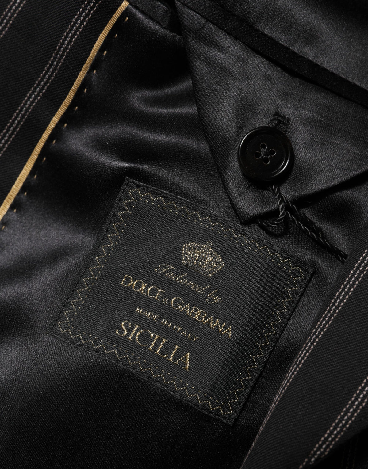 Indulge in the exquisite Dolce & Gabbana Black Stripes SICILIA Blazer, where luxurious fabrics and impeccable Italian craftsmanship elevate your elegance for every occasion.