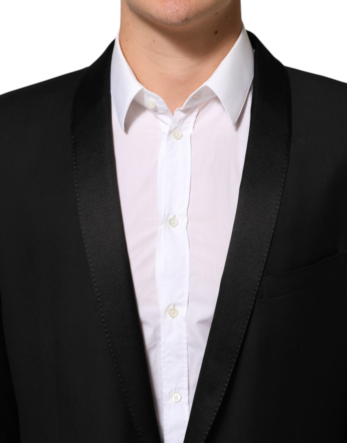 Elevate your wardrobe with the Dolce & Gabbana Black Wool GOLD 1 Button Suit Blazer, a masterpiece of Italian craftsmanship that embodies timeless elegance and sophisticated allure.
