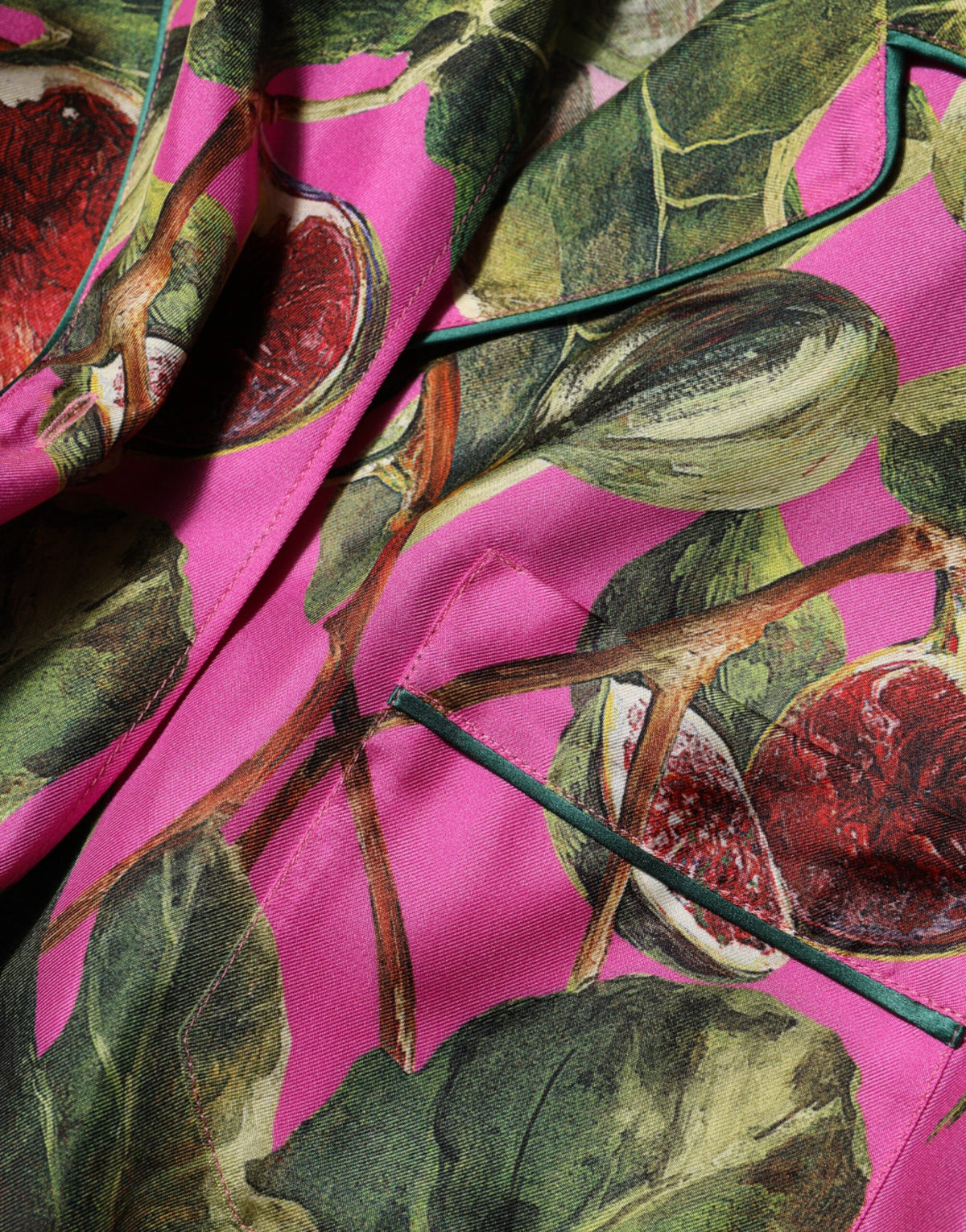 Indulge in the exquisite Dolce & Gabbana Hot Pink Fig Printed Silk Shirt Blouse Top, where luxurious silk meets timeless Italian craftsmanship, perfect for the discerning fashion connoisseur.