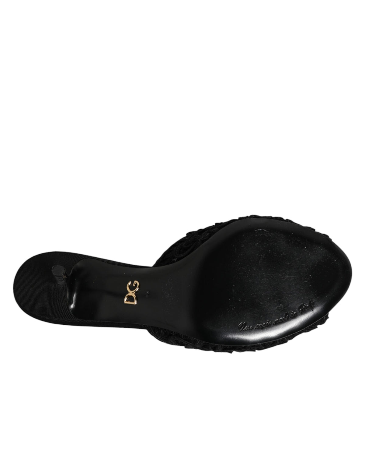 Step into luxury with Dolce & Gabbana's Black Embroidered Slip On Heels, crafted in Italy from exquisite materials, embodying elegance and sophistication for every occasion.