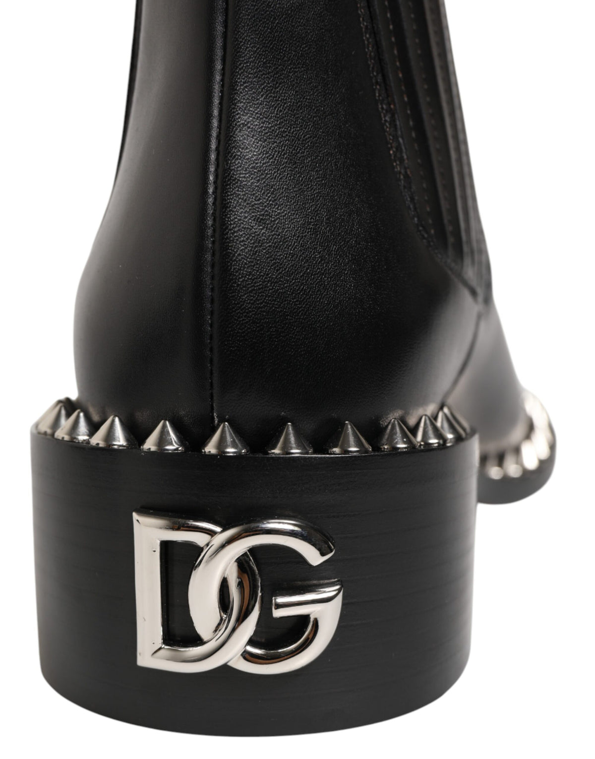 Indulge in the exquisite Dolce & Gabbana Black Studded Chelsea Short Ankle Boots, where premium leather meets unparalleled craftsmanship, embodying timeless elegance and luxury.