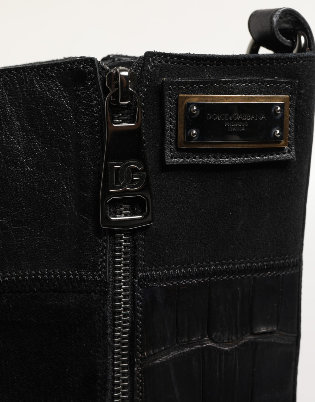 Indulge in the exquisite Dolce & Gabbana Black Patchwork Leather Mid Calf Boot, a masterpiece of Italian craftsmanship blending luxurious horse and crocodile leather for timeless elegance.