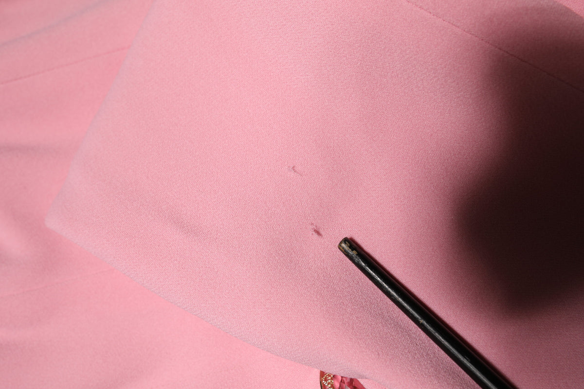 Experience the allure of the Dolce & Gabbana Pink Embellished Sheath Mermaid Gown, a testament to Italian craftsmanship, designed for those who embody elegance and sophistication.