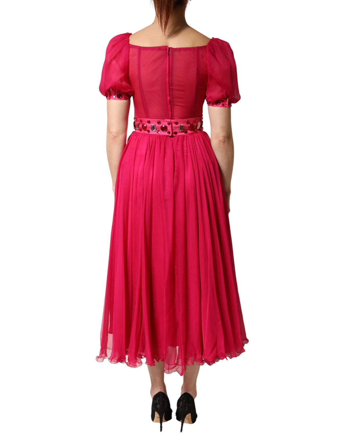 Indulge in the exquisite allure of the Dolce & Gabbana Pink Silk Embellished A-line Midi Dress, a timeless masterpiece of Italian craftsmanship that embodies luxury and sophistication.