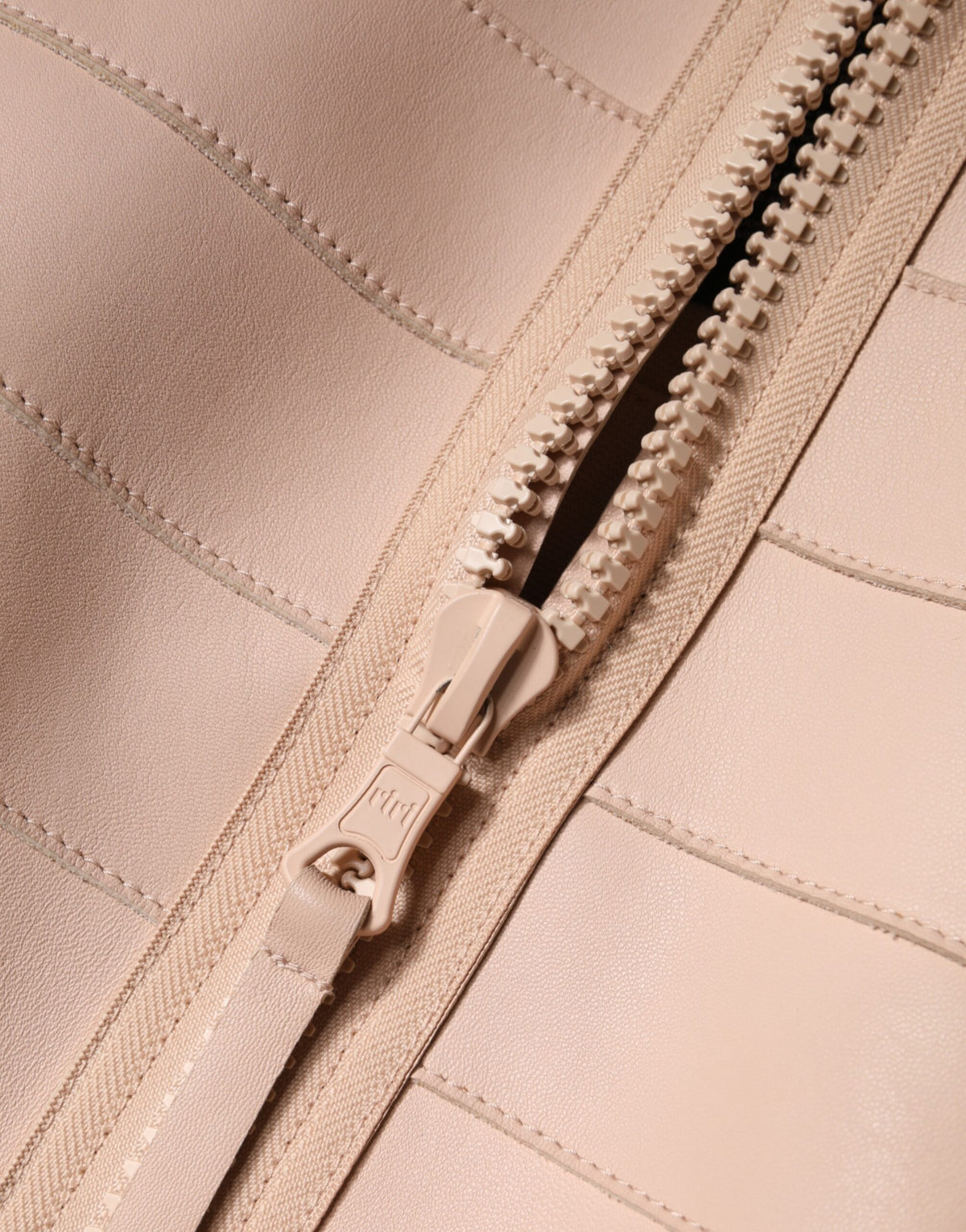 Elevate your elegance with the Dsquared² Beige Leather Short Sleeves Sheath Mini Dress, a masterpiece of Italian craftsmanship that embodies timeless luxury and refined allure.